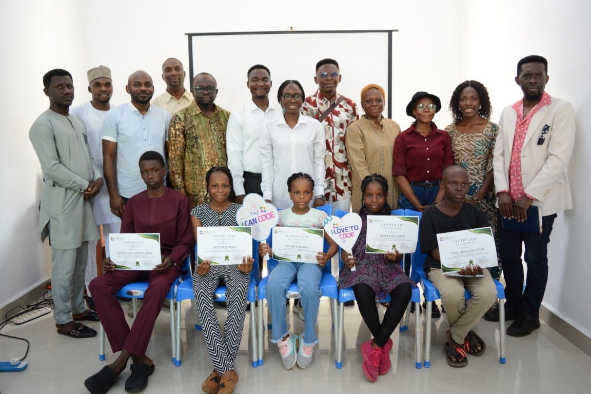 A Toko Academy cohort photographed together at the end of their programme
