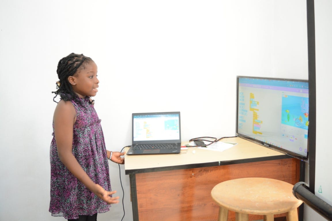 A child working at a computer in the Toko Academy training room in Yola