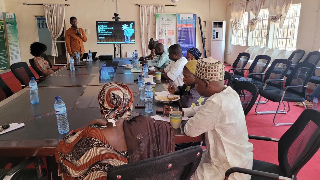 Participants following a presentation on screen at a Toko Academy session in Yola